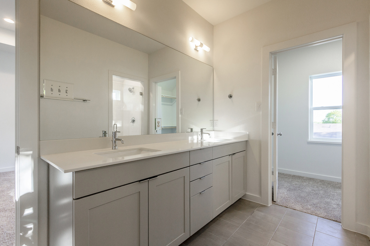 Bathroom Design (Custom Texas Homes): Master Bath with Grey Cabinets