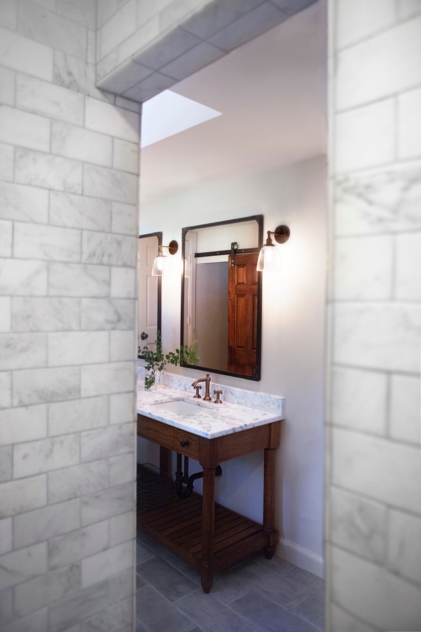 Bathroom Design (Custom Texas Homes): Cararra Tile and Custom Furnityre Vanity with Restoration Hardware