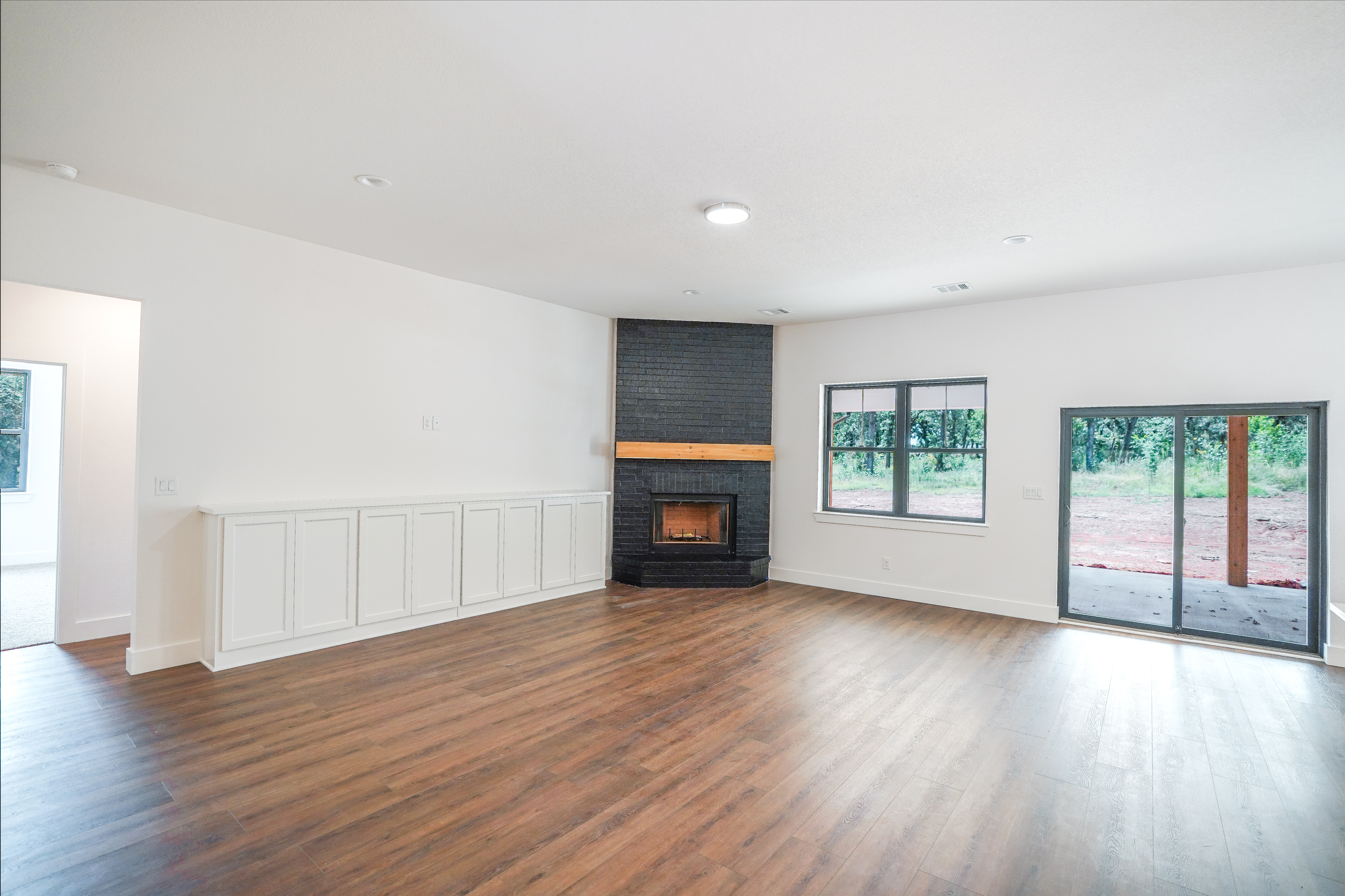 Hamilton Custom Family_Black Brick Fireplace