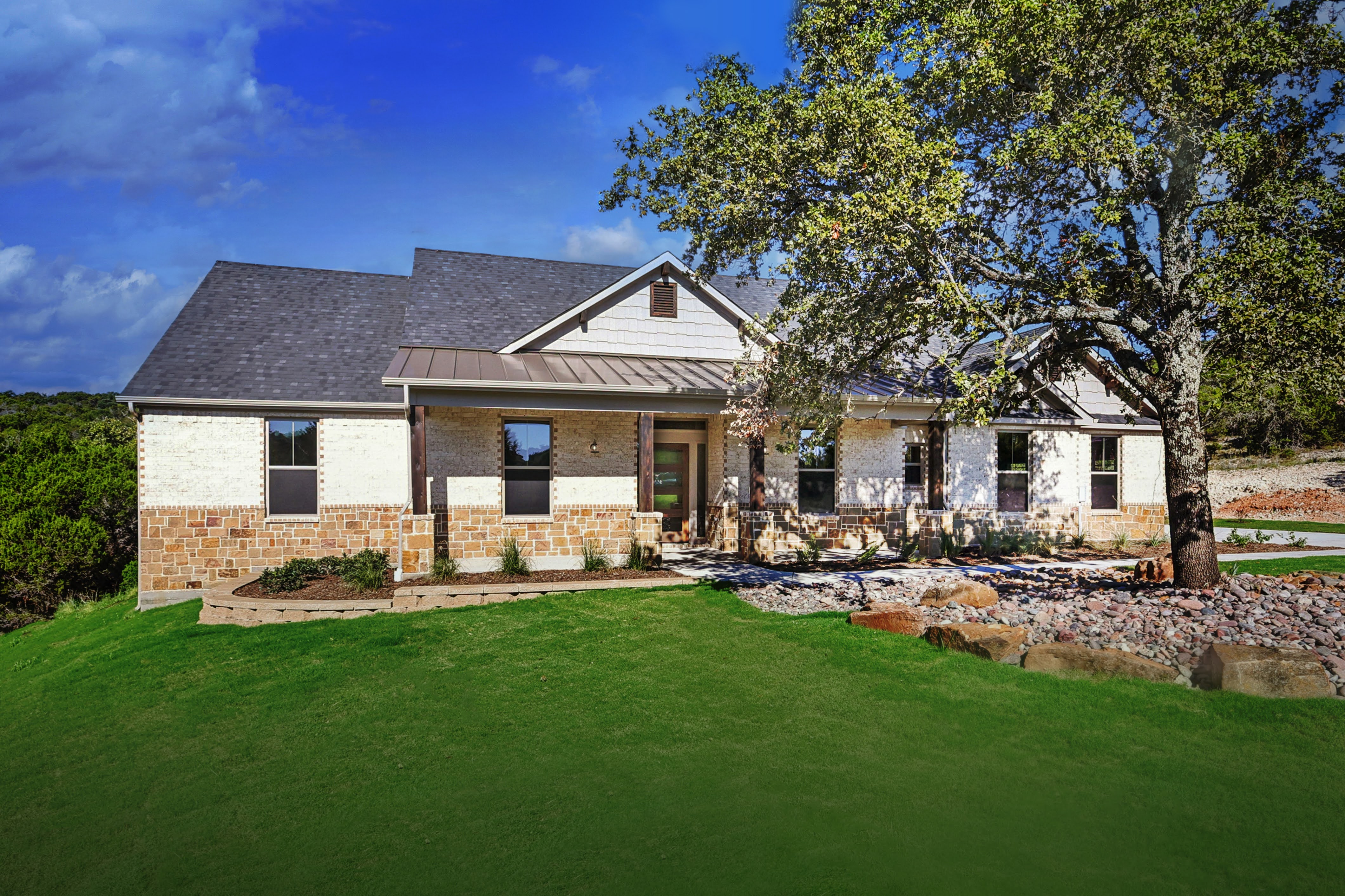 Calvin Legacy White brick Sandstone Tree Blue Sky