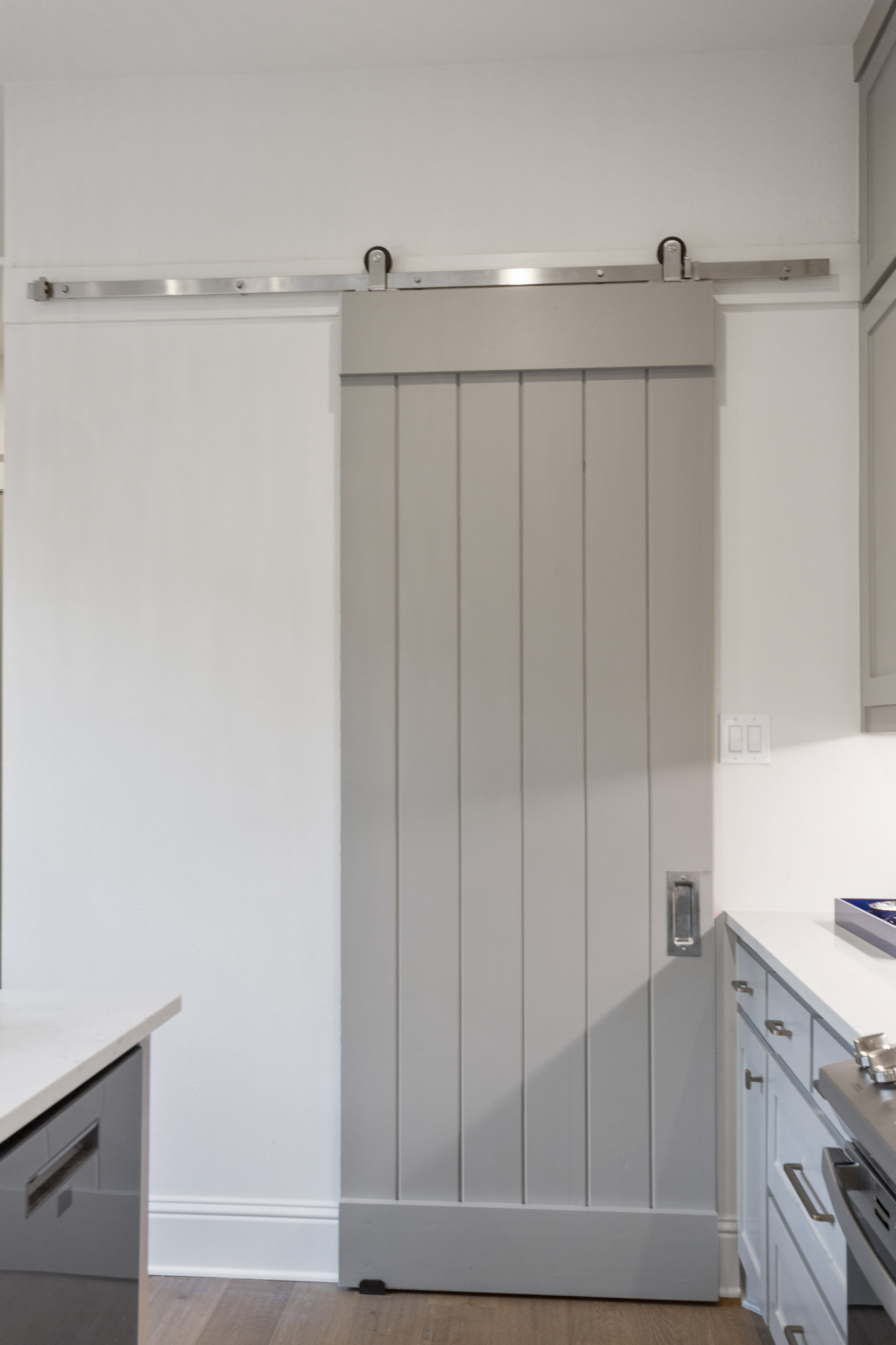 barn door in kitchen at pantry