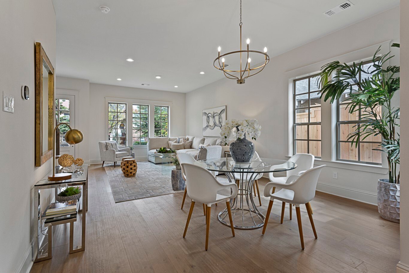 Townhome dining and living brass chandelier